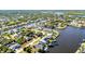 Aerial view showcasing the waterfront community with canals and boating opportunities at 4178 Rose Arbor Cir, Port Charlotte, FL 33948