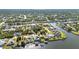 Picturesque aerial shot of waterfront residences with lush foliage and interconnected canal waterways at 4178 Rose Arbor Cir, Port Charlotte, FL 33948