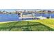 This backyard offers a boat lift and dock perfect for boaters and water sport enthusiasts at 4178 Rose Arbor Cir, Port Charlotte, FL 33948