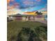 Charming single-story home boasts a well-manicured lawn and a two-car garage in a peaceful neighborhood at 4178 Rose Arbor Cir, Port Charlotte, FL 33948