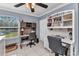 Functional office space with desk area, window, and shelving at 4178 Rose Arbor Cir, Port Charlotte, FL 33948