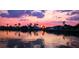 Enjoy stunning sunset views over the water from this waterfront community at 4178 Rose Arbor Cir, Port Charlotte, FL 33948