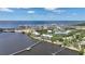 Breathtaking aerial view of a coastal community featuring stunning waterfront vistas and lush greenery at 5114 Melbourne St # A202, Punta Gorda, FL 33980