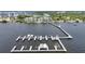 Picturesque aerial view of marina and surrounding waterfront community under a blue sky at 5114 Melbourne St # A202, Punta Gorda, FL 33980