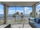 Enjoy beautiful views from this screened in balcony with comfortable seating, perfect for relaxation at 5114 Melbourne St # A202, Punta Gorda, FL 33980