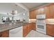Beautiful kitchen showcasing granite countertops, modern appliances, and seamless access to the living area at 5114 Melbourne St # A202, Punta Gorda, FL 33980