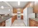 Well-equipped kitchen with stainless steel appliances, granite countertops, and ample cabinet space at 5114 Melbourne St # A202, Punta Gorda, FL 33980