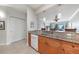 Updated kitchen featuring granite countertops, modern appliances, and an open layout at 5114 Melbourne St # A202, Punta Gorda, FL 33980