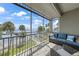 Screened lanai with outdoor seating and a scenic view at 5114 Melbourne St # A202, Punta Gorda, FL 33980