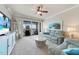 Cozy living room featuring comfortable seating, stylish decor, and scenic waterfront views at 5114 Melbourne St # A202, Punta Gorda, FL 33980