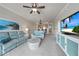 Inviting living room with open floor plan leading to the kitchen and a comfortable seating arrangement at 5114 Melbourne St # A202, Punta Gorda, FL 33980