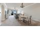 Bright living and dining space with comfortable seating and scenic waterfront views at 5114 Melbourne St # A202, Punta Gorda, FL 33980