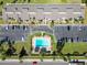 Overhead shot of condo complex with parking and a pool offers a tropical setting at 5416 Swift Rd # 27, Sarasota, FL 34231