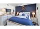 Bedroom with nautical decor, ceiling fan, window, lamps and whitewashed furniture at 5416 Swift Rd # 27, Sarasota, FL 34231