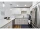 Clean kitchen with white cabinets, stainless steel appliances and plenty of counter space at 5416 Swift Rd # 27, Sarasota, FL 34231