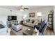 Living room with comfortable seating, wood floors, and ample natural light at 5416 Swift Rd # 27, Sarasota, FL 34231