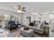 Bright living room with modern furnishings, ceiling fans, and an inviting open-concept design at 5416 Swift Rd # 27, Sarasota, FL 34231