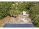 Aerial view of backyard featuring storage shed and fencing at 6329 David Blvd, Port Charlotte, FL 33981