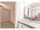 Bathroom features a vessel sink, wood accents, and a shower with glass door in the background at 6329 David Blvd, Port Charlotte, FL 33981