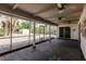 Spacious screened porch with ceiling fans and views of the backyard at 6329 David Blvd, Port Charlotte, FL 33981