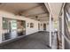 Spacious screened porch with ceiling fans and access to the kitchen at 6329 David Blvd, Port Charlotte, FL 33981
