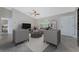 Staged living room features recessed lighting, ceiling fan, and tile flooring at 6346 Lachine Ave, North Port, FL 34291