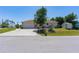 Charming single-story home with an attached garage and well-maintained lawn at 8315 Raoul Ave, North Port, FL 34291