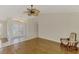 Welcoming foyer with elegant double doors and wood flooring, creating a warm and inviting entrance to the home at 452 Greenwich Nw Ave, Port Charlotte, FL 33952