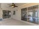A spacious covered patio with great views of the dining room, living room, and pool at 452 Greenwich Nw Ave, Port Charlotte, FL 33952