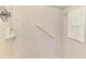 Clean shower with white tile and a grab bar at 452 Greenwich Nw Ave, Port Charlotte, FL 33952