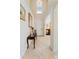 Inviting entryway with high ceilings, elegant decor, and tile flooring leading into the home at 11663 Anhinga Ave, Venice, FL 34292