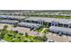 Scenic aerial perspective of condo building near a pond highlighting the overall layout and community at 14204 Heritage Landing Blvd # 712, Punta Gorda, FL 33955