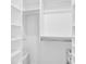 Walk-in closet features custom shelving and ample storage space for wardrobe needs at 14204 Heritage Landing Blvd # 712, Punta Gorda, FL 33955