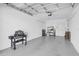 Spacious and clean garage with grill, shelving, and ample storage space at 14204 Heritage Landing Blvd # 712, Punta Gorda, FL 33955