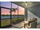 Screened lanai overlooking a tranquil lake offers serene outdoor living at 14204 Heritage Landing Blvd # 712, Punta Gorda, FL 33955