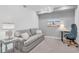 Bright living room with plush seating, modern lighting, and stylish decor at 14204 Heritage Landing Blvd # 712, Punta Gorda, FL 33955