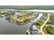 Beautiful aerial view of a waterfront community featuring homes with private docks and canal access at 15490 Seafoam Cir, Port Charlotte, FL 33981