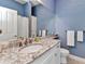 Bathroom featuring granite countertops and modern fixtures at 15490 Seafoam Cir, Port Charlotte, FL 33981