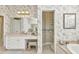 Bright bathroom with a vanity and a separate toilet room at 15490 Seafoam Cir, Port Charlotte, FL 33981