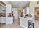 Well-lit kitchen boasting granite countertops and stainless steel appliances at 15490 Seafoam Cir, Port Charlotte, FL 33981