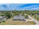 A beautifully situated single-Gathering home in a quiet location with mature trees, landscaping, and an expansive yard at 1556 Eagle St, Port Charlotte, FL 33952