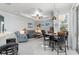 Living room with tile flooring, stylish furnishings, and a tray ceiling at 16450 Bauers Ave, Port Charlotte, FL 33954