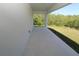 Covered porch overlooking the backyard at 17374 Gadsen Ave, Port Charlotte, FL 33948