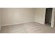 Bedroom features neutral carpet, paint and trim at 17374 Gadsen Ave, Port Charlotte, FL 33948