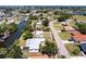 Located near a waterway, this beautiful home is surrounded by green lawns and mature trees at 182 Dowling Ne Ave, Port Charlotte, FL 33952