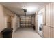 Attached garage featuring an automatic door opener and room for storage at 182 Dowling Ne Ave, Port Charlotte, FL 33952
