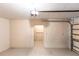 Spacious garage with an automatic door, and ample space for parking and storage solutions at 182 Dowling Ne Ave, Port Charlotte, FL 33952