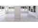 Bright sun room featuring tile flooring and lots of windows for natural light and views at 182 Dowling Ne Ave, Port Charlotte, FL 33952