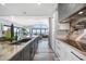 Modern kitchen with sleek countertops, stainless steel appliances, and water view at 1820 Jamaica Way, Punta Gorda, FL 33950