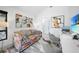 Bright home office featuring modern decor, comfortable seating, and a large desk with beach view at 1820 Jamaica Way, Punta Gorda, FL 33950